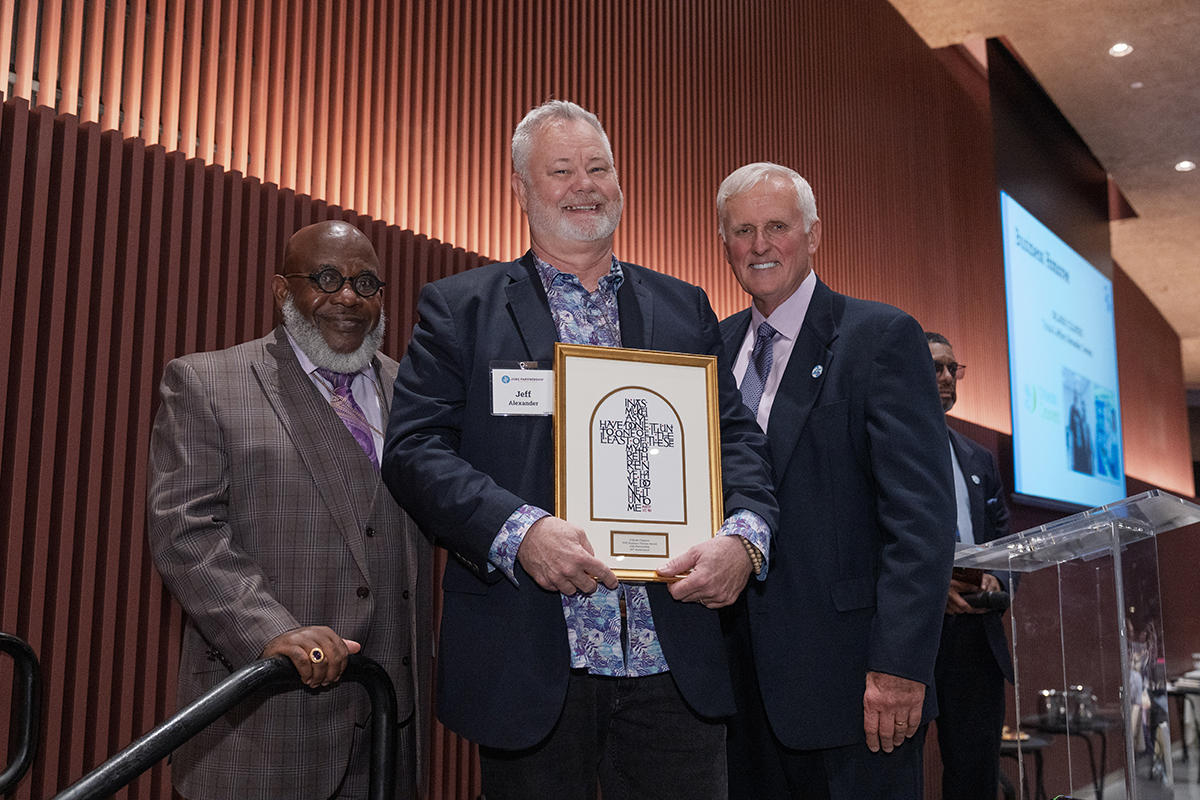 person holding a plaque